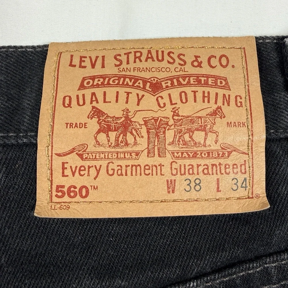 Vintage 90s Levi's 560 Loose Fit Tapered Leg Black Jeans 38x34 USA Made 1999